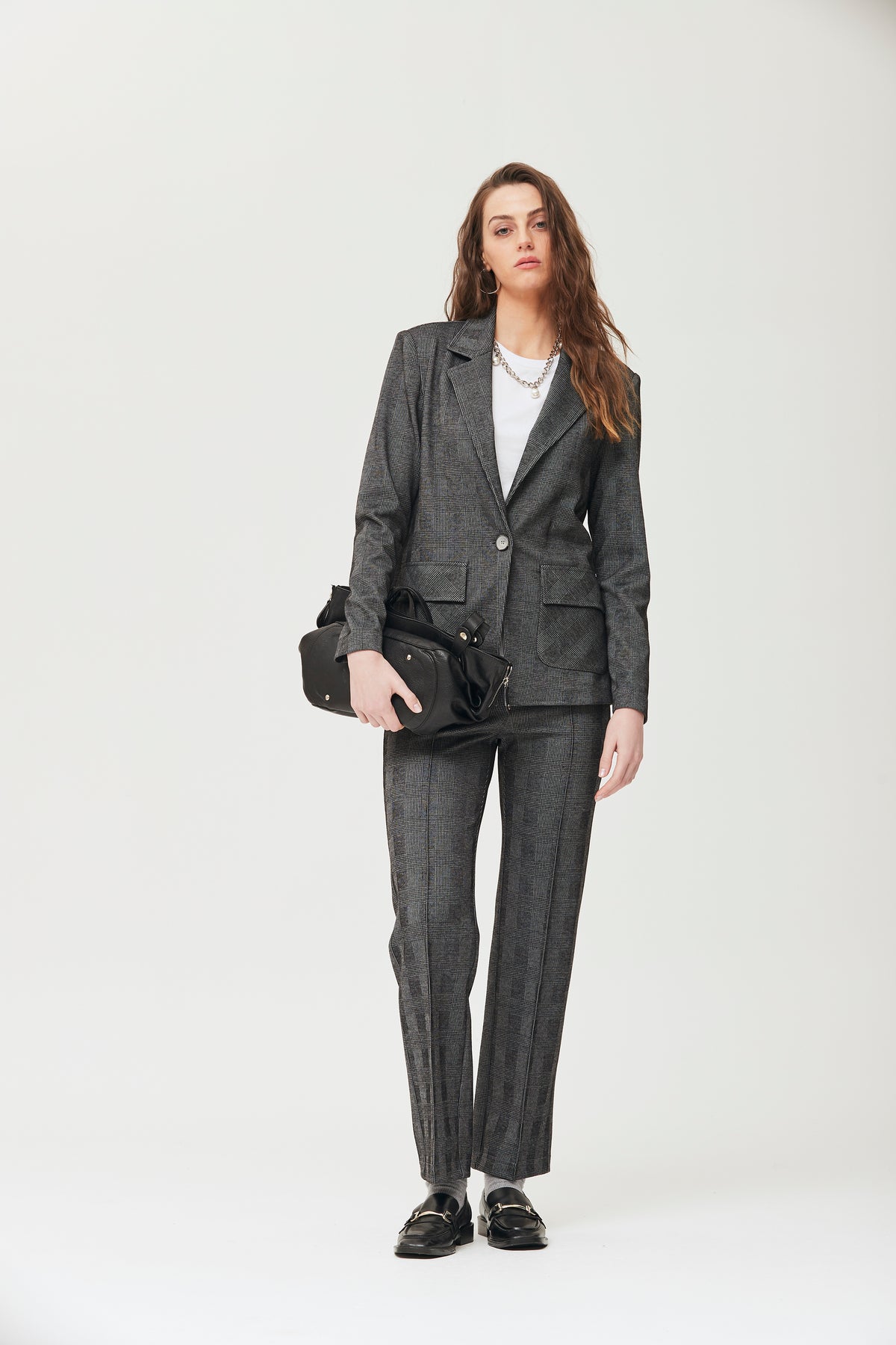 Prince of wales checked knit Osuna trousers