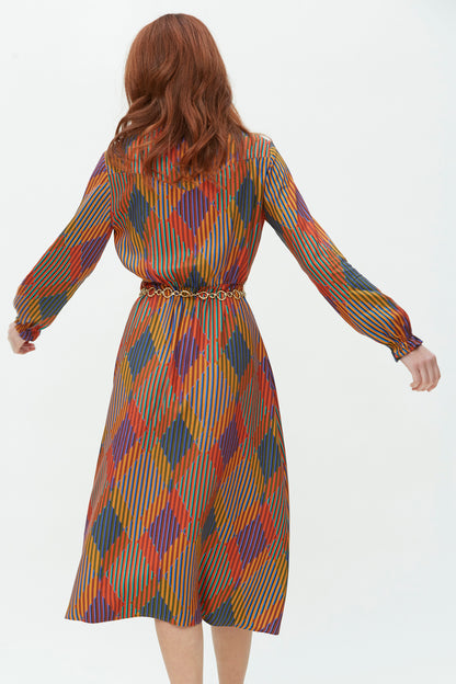 VESTIDO CAMISERO VOLANTE-VISCOSA ESTAMPADA